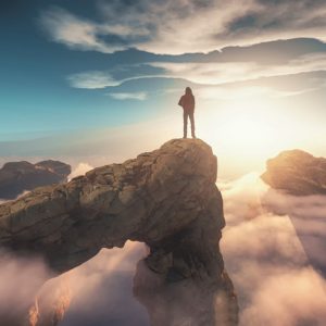 Traveler with a backpack standing on a mountain peak above clouds. 3d render illustration